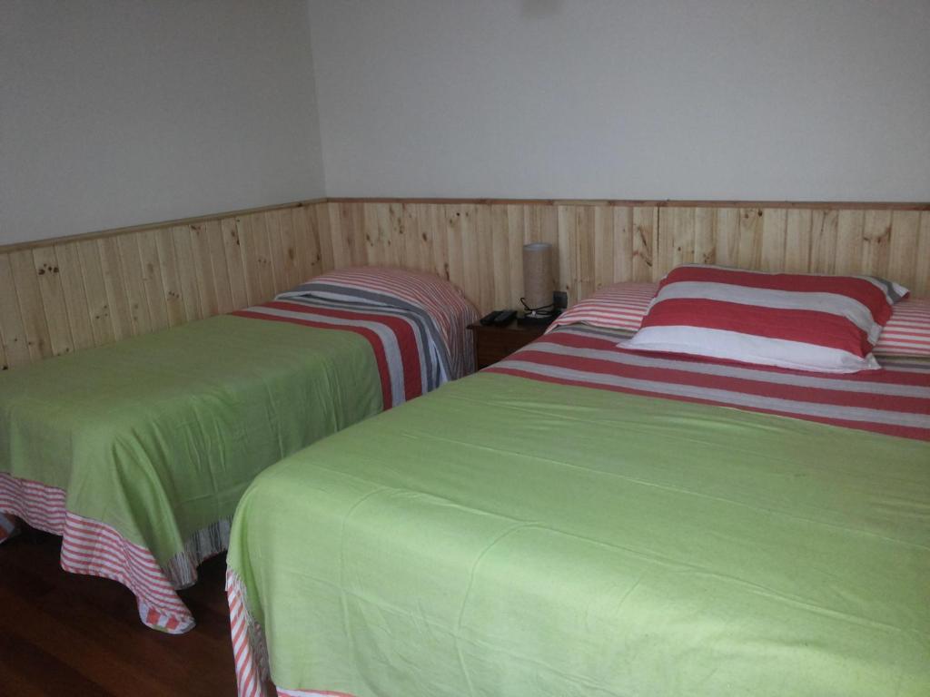 Voodi või voodid majutusasutuse Hostal Balmaceda La Serena toas