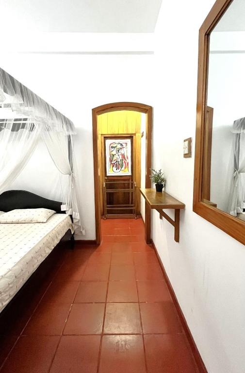 Postel nebo postele na pokoji v ubytování Pearl House