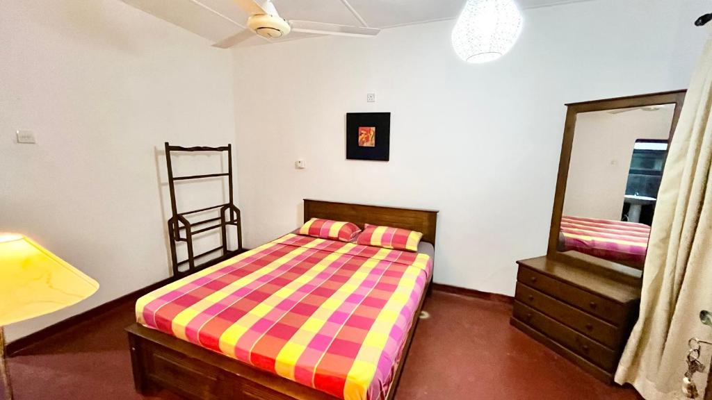 Postel nebo postele na pokoji v ubytování Pearl House