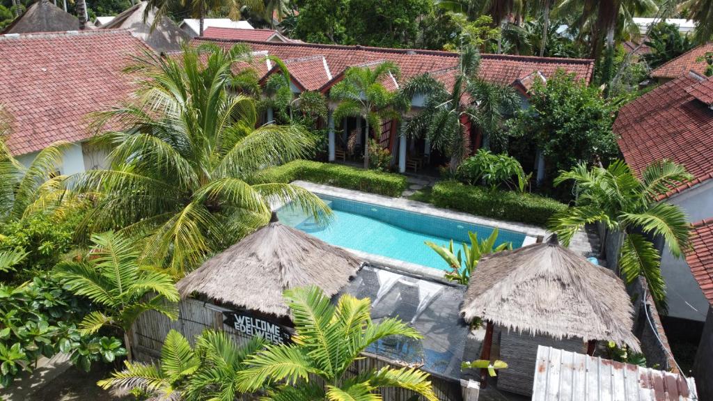 an aerial view of a resort with a swimming pool at Edelweiss Homestay in Kuta Lombok