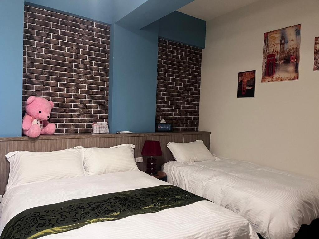 Postel nebo postele na pokoji v ubytování Happy Life B&B