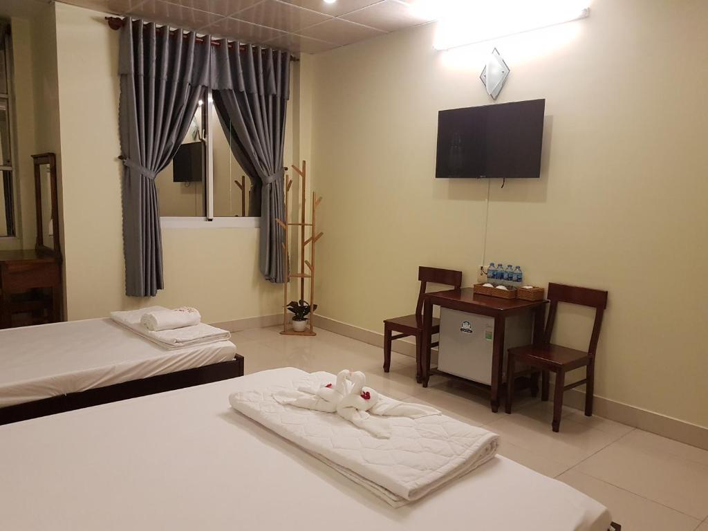 Hostel Đặng Lợi ホステルダンロイ - Делюкс семейный номер