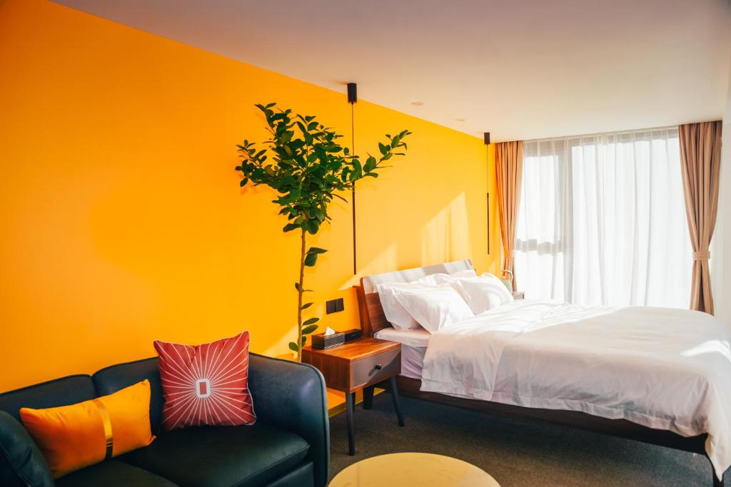 Postel nebo postele na pokoji v ubytování Lost In Beauty Guest House 龙脊梯田野望民宿
