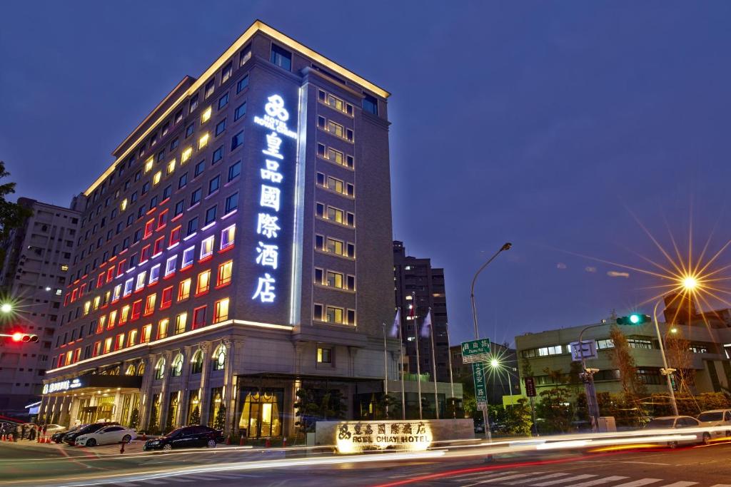 a building with a sign on the side of it at Royal Chiayi Hotel in Chiayi City