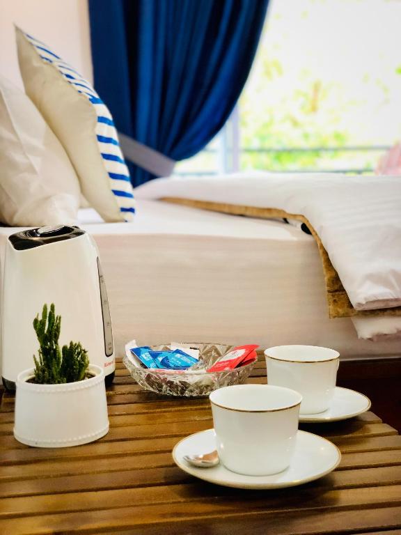 Příslušenství pro přípravu čaje a kávy v ubytování Star Holiday Home