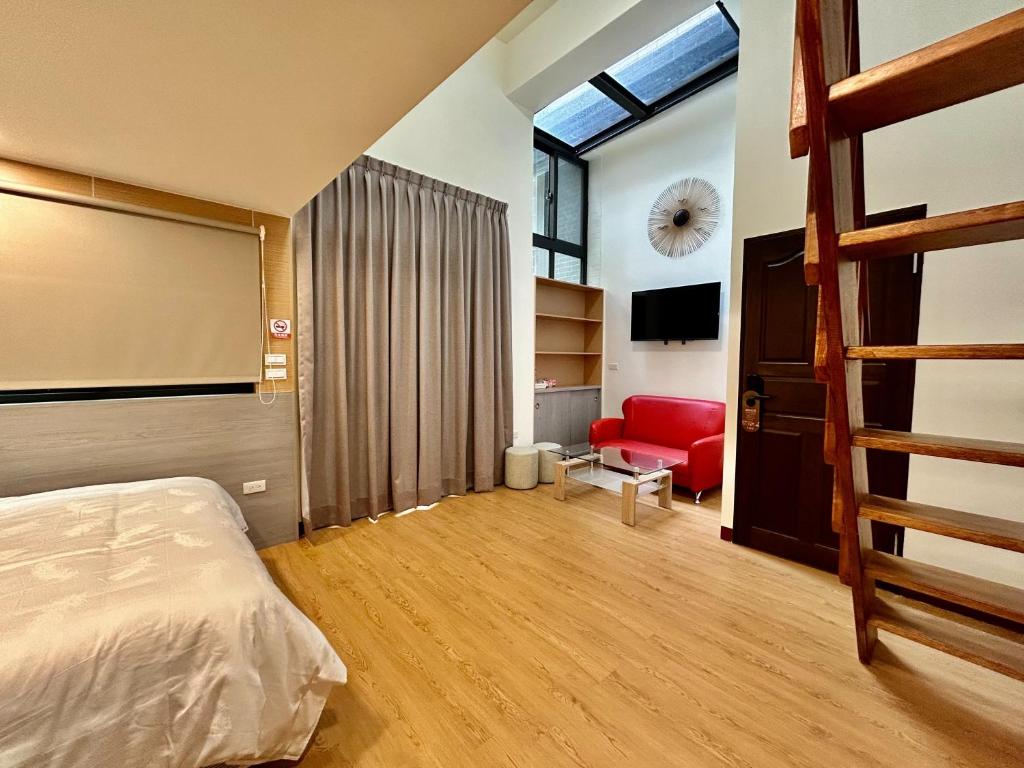 Postel nebo postele na pokoji v ubytování Xianwang Homestay