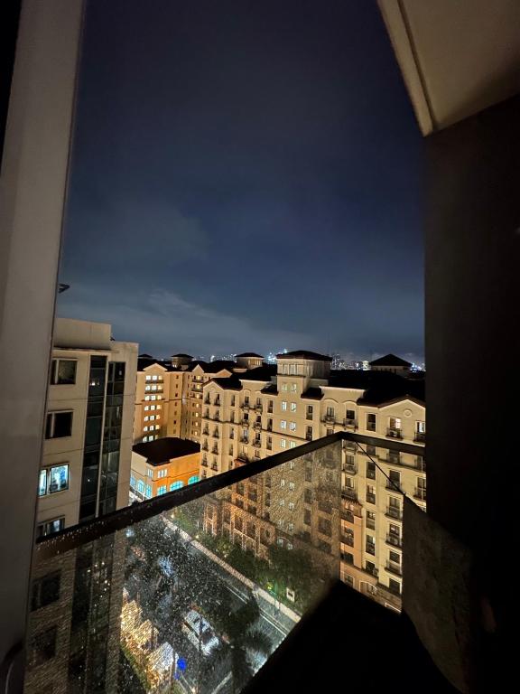 Nespecifikovaný výhled na destinaci Manila nebo výhled na město při pohledu z aparthotelu