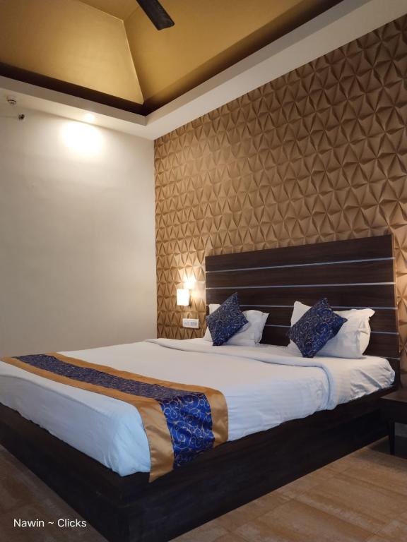 Postel nebo postele na pokoji v ubytování Redfox Hotel- Aminjikarai