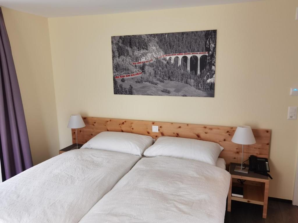 Cama o camas de una habitación en Hotel Albula & Julier