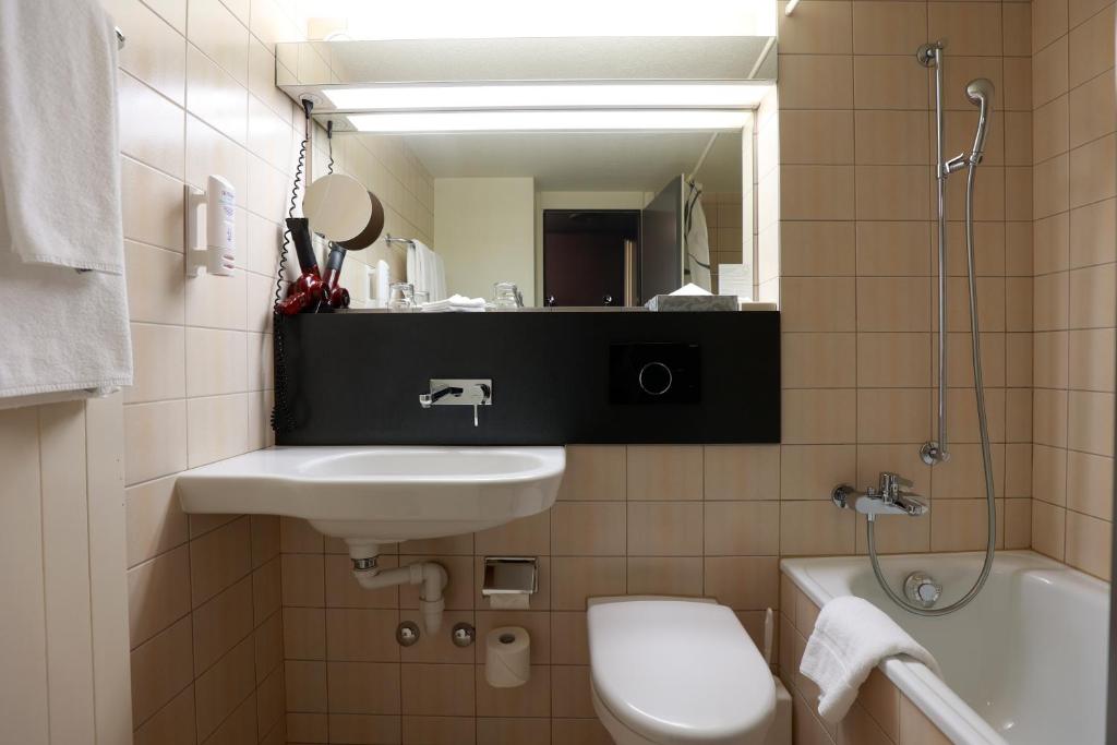 Koupelna v ubytování Hotel Thurgauerhof Self-Check-in