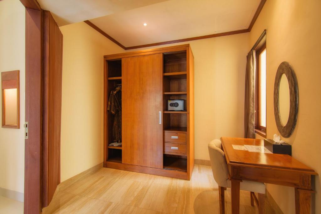 TV a/nebo společenská místnost v ubytování Champlung Sari Villa & Spa Ubud