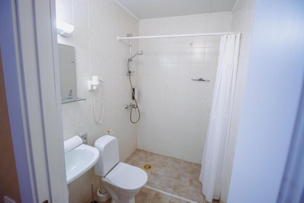 Koupelna v ubytování Hotel Promenaadi