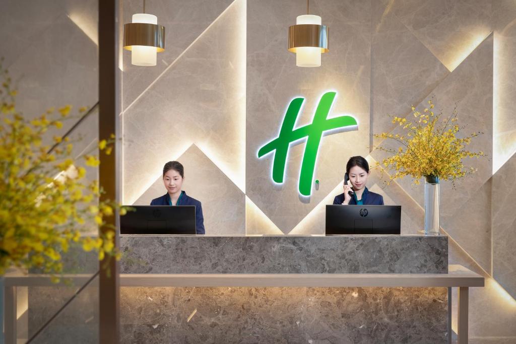 Členové personálu v ubytování Holiday Inn Quanzhou Donghai by IHG