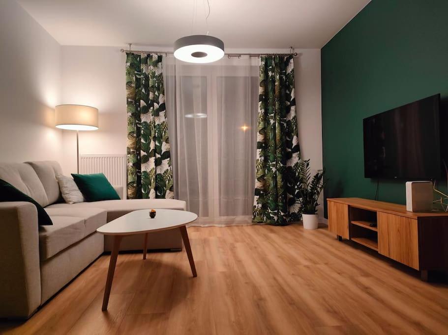 Posezení v ubytování A beautiful green apartment near Cracow