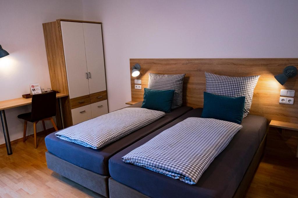 Ένα ή περισσότερα κρεβάτια σε δωμάτιο στο Stadtplatz23 B&B