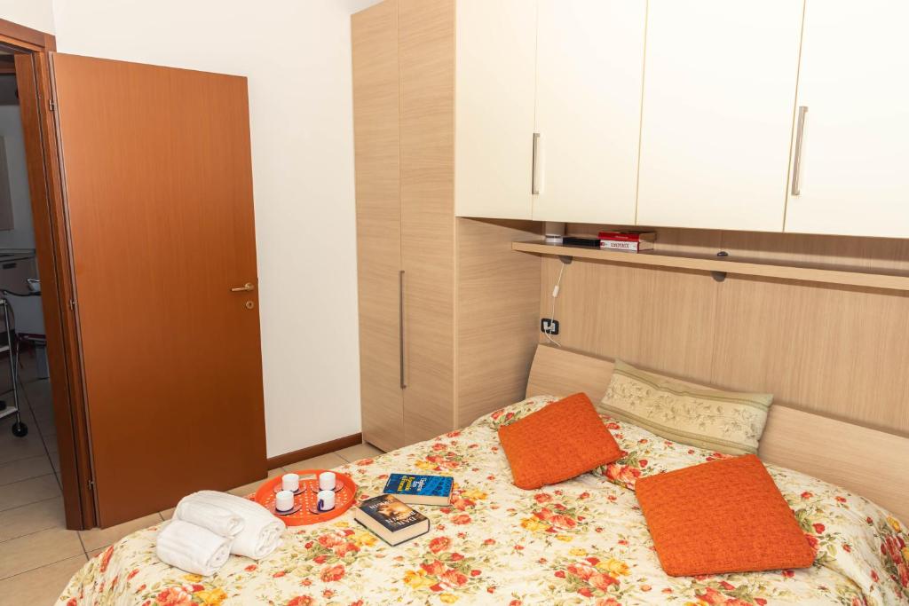 Posteľ alebo postele v izbe v ubytovaní Residenza Coccinelle vista Lago d'Iseo