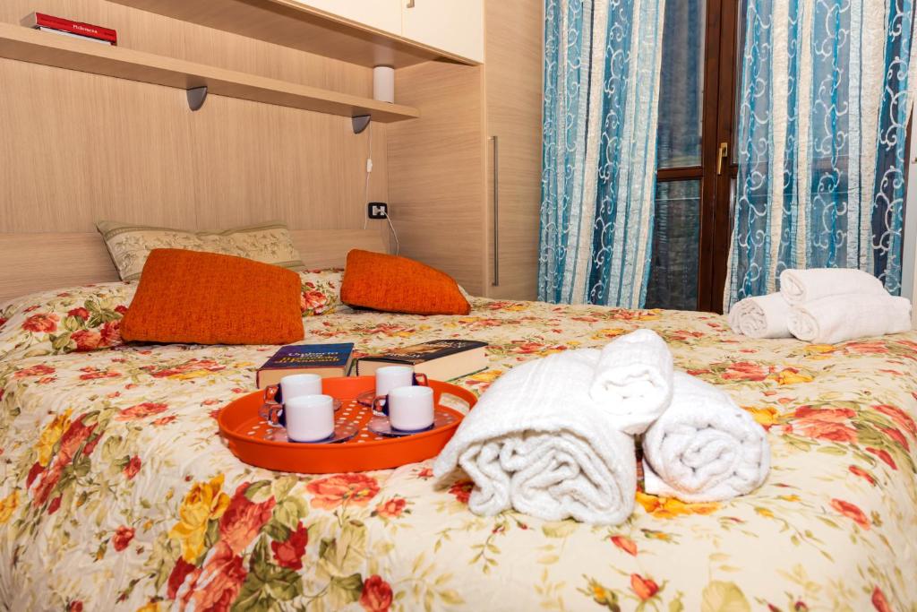 Posteľ alebo postele v izbe v ubytovaní Residenza Coccinelle vista Lago d'Iseo