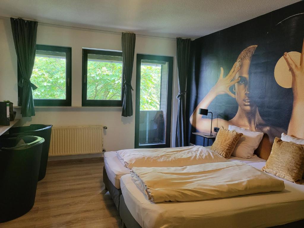 Postel nebo postele na pokoji v ubytování Zur Schmitte