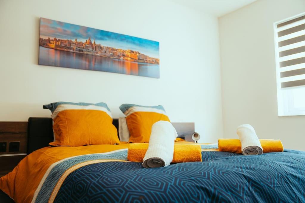 Postel nebo postele na pokoji v ubytování Luxurious Gozo Apartment, Qala