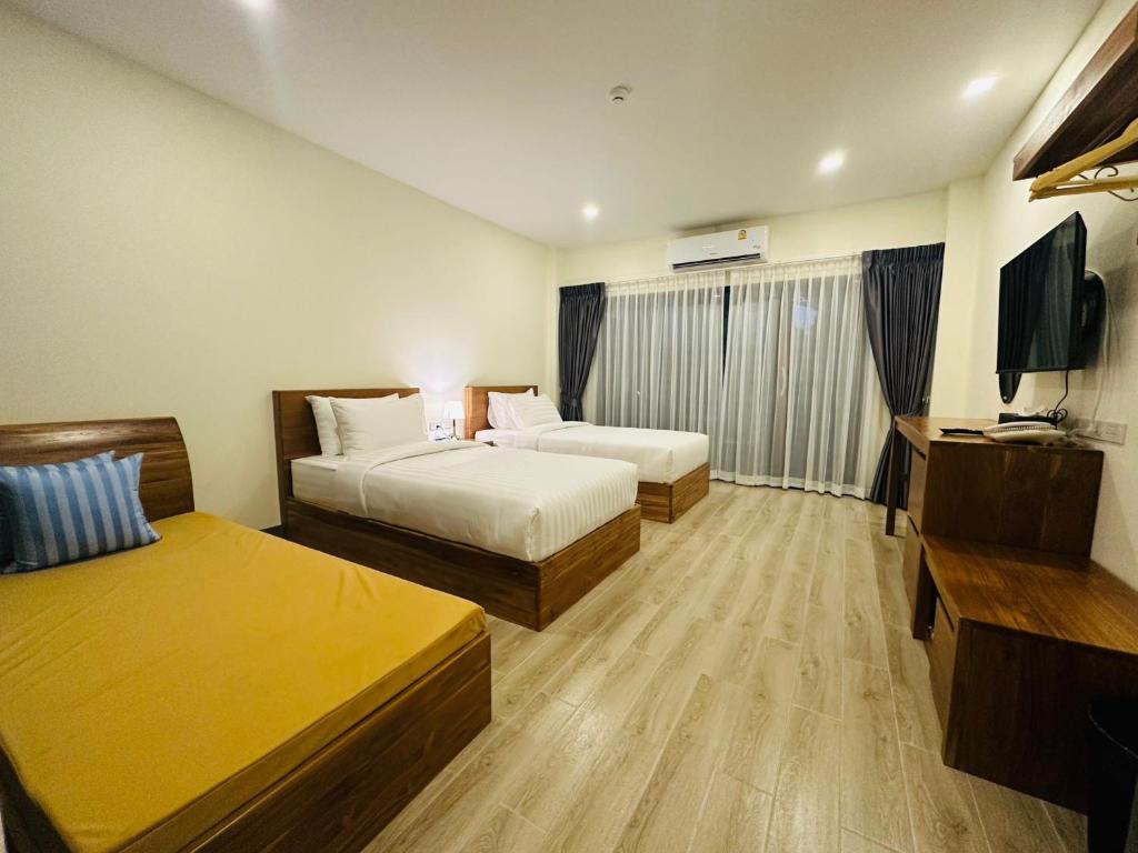 Postel nebo postele na pokoji v ubytování 22 Twenty Two Chiang Mai