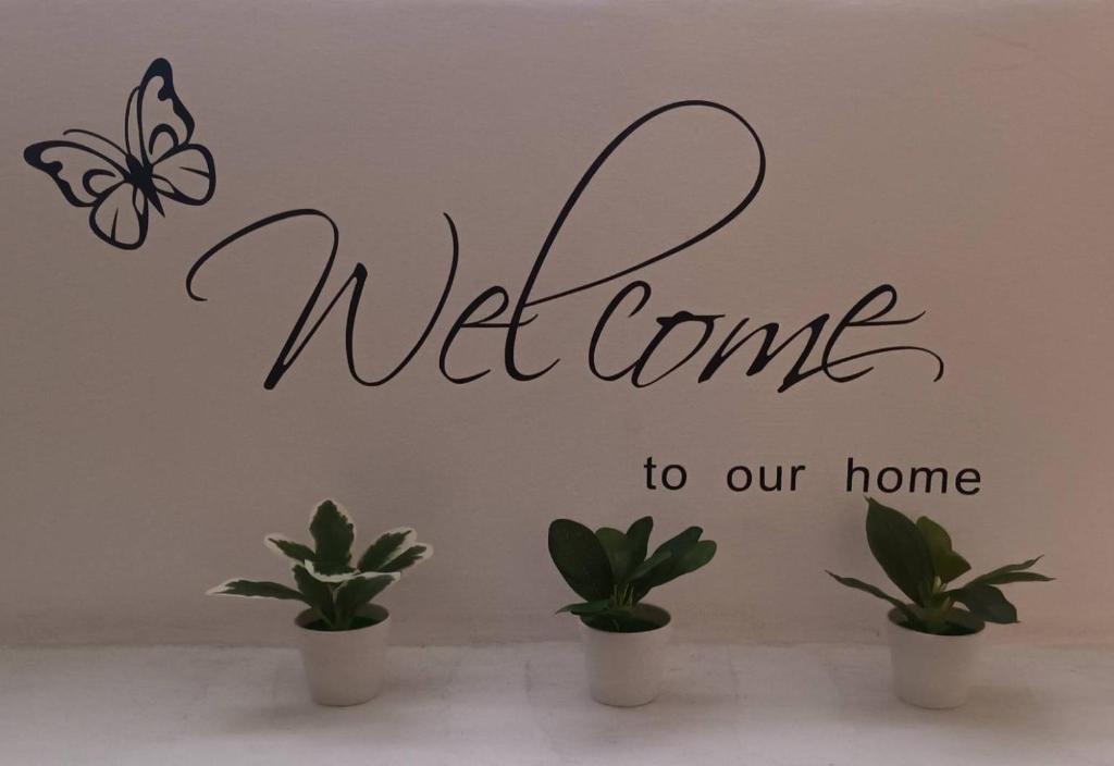 a butterfly welcome to our home wall sticker at Melon Hub ใกล้สนามบินสุวรรณภูมิ in Ban Bang Toei (1)