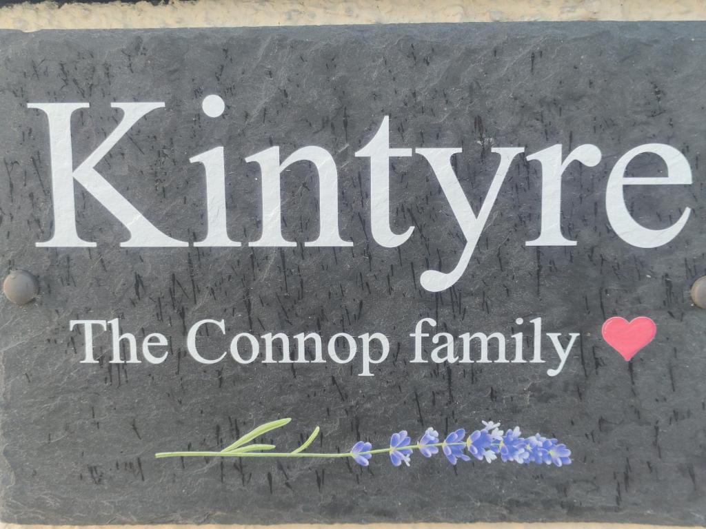 a sign that says kiven the comup family at Kintyre Caravan in Portree