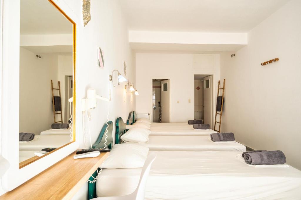 Postel nebo postele na pokoji v ubytování Palm