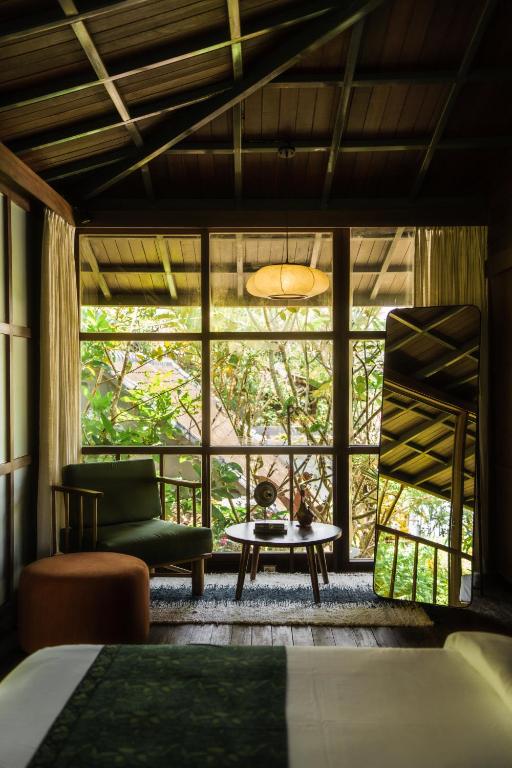 Grün Ubud房間的床