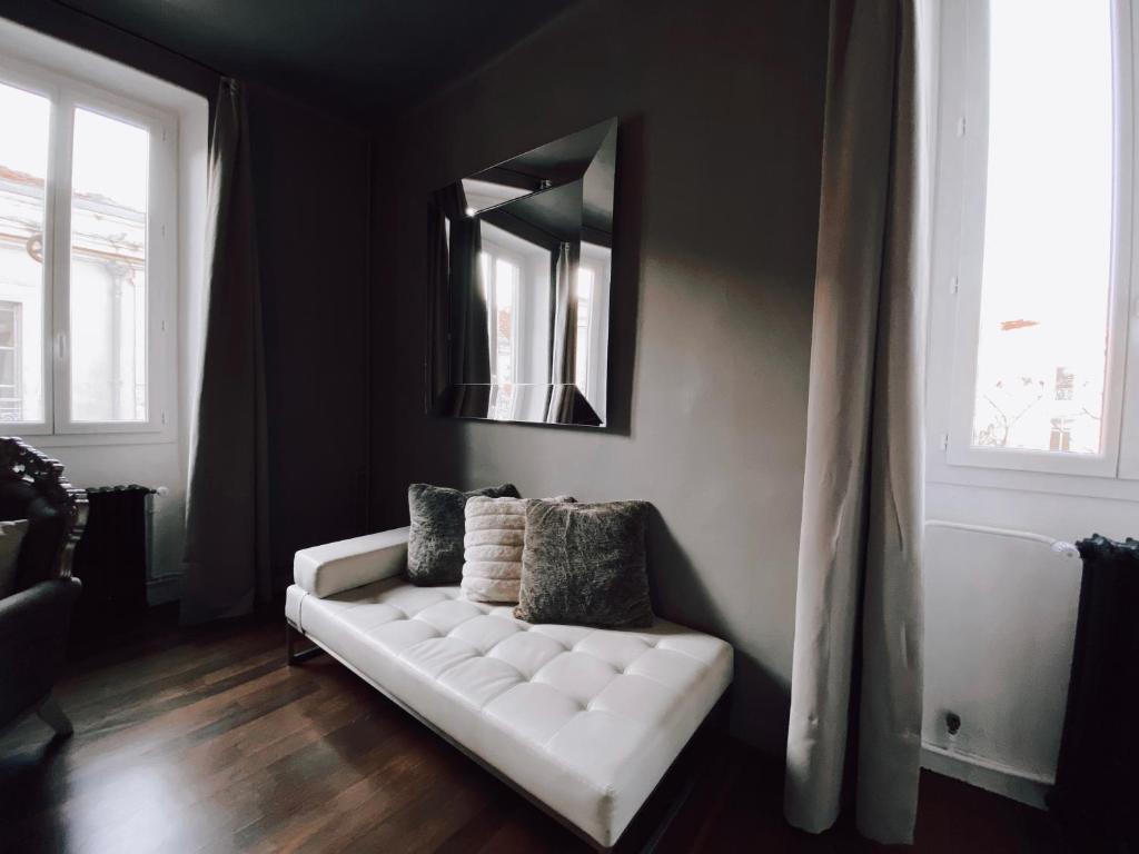 Postel nebo postele na pokoji v ubytování Royal Hôtel