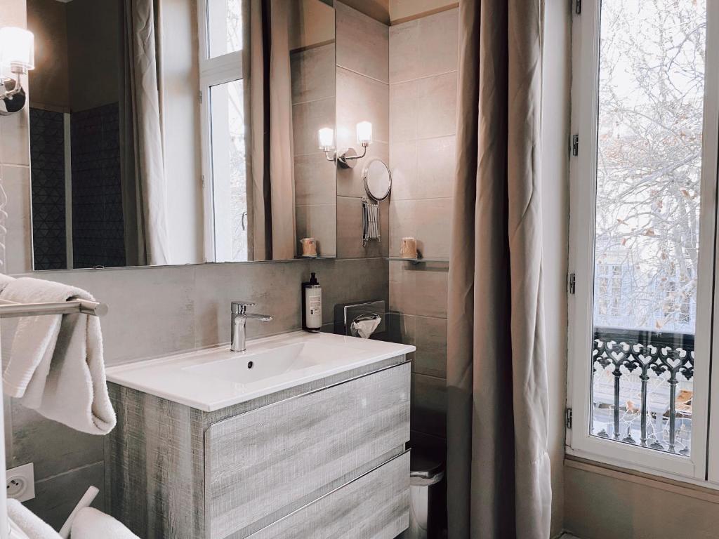 Koupelna v ubytování Royal Hôtel