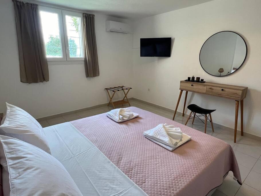 Postel nebo postele na pokoji v ubytování Krios Guesthouse