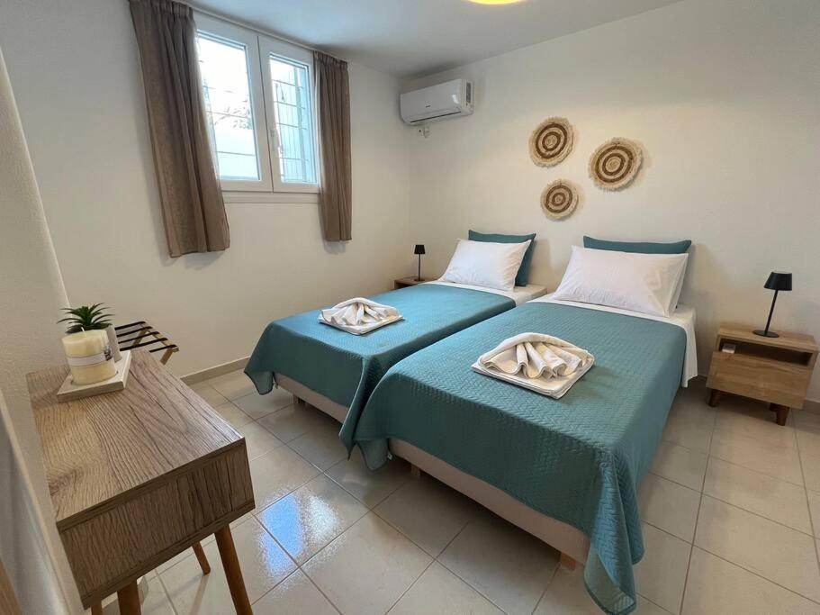 Postel nebo postele na pokoji v ubytování Krios Guesthouse