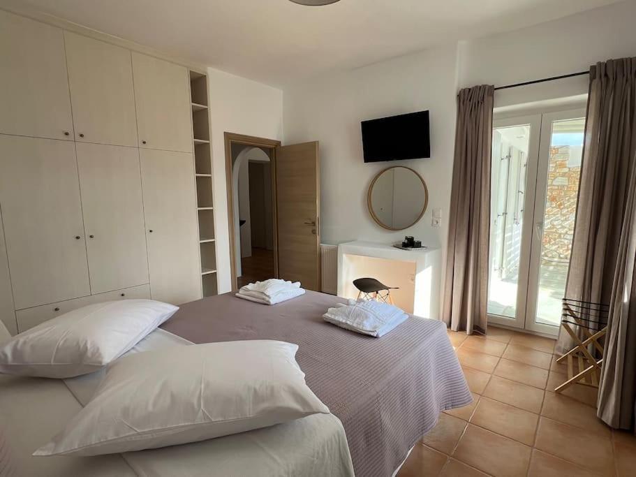 Postel nebo postele na pokoji v ubytování Krios Guesthouse