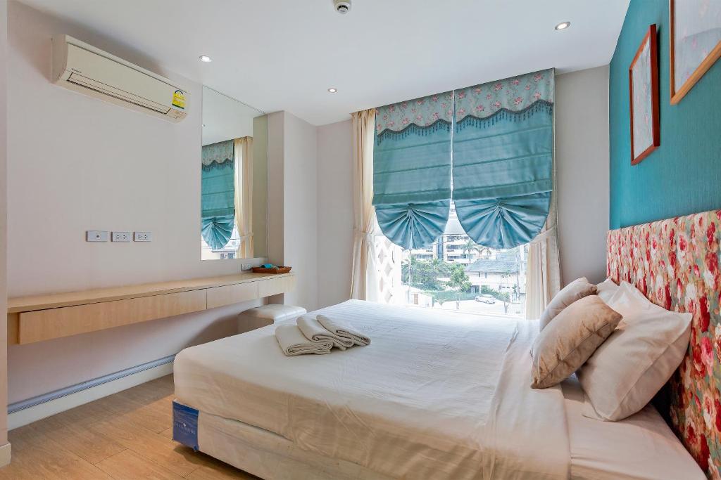 Grande Carribean l Guest Friendly l Seaview Pool view Condo in Pattaya - Appartement Avec Vue Sur Jardin