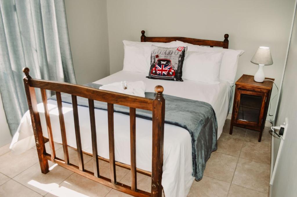 Ένα ή περισσότερα κρεβάτια σε δωμάτιο στο Die Karee Tuiste