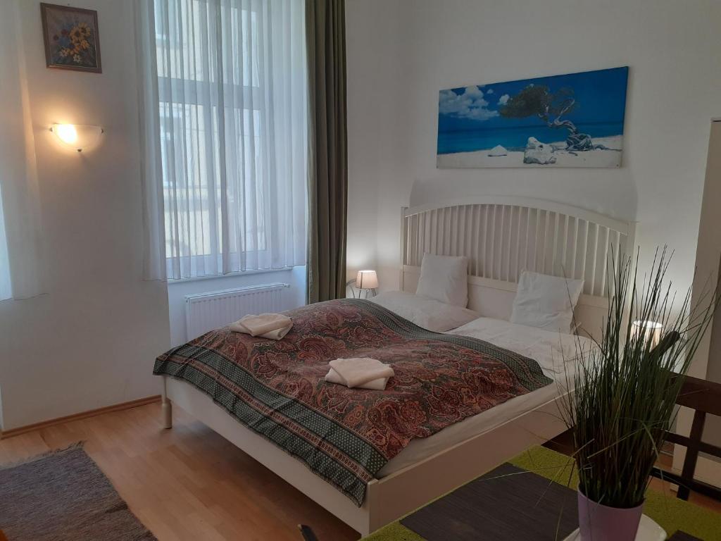 Posteľ alebo postele v izbe v ubytovaní HappyHostel