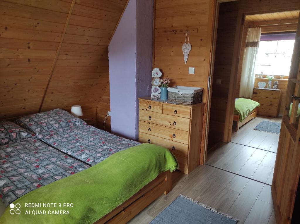 Postel nebo postele na pokoji v ubytování Domek Mateo