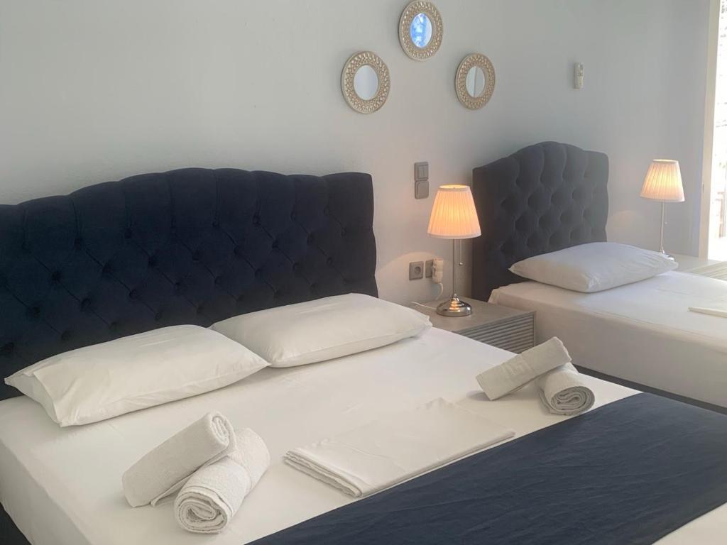 Postel nebo postele na pokoji v ubytování Chrysa House