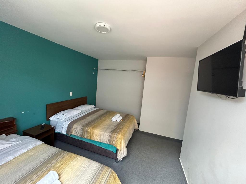 Postel nebo postele na pokoji v ubytování Dream Place Trujillo