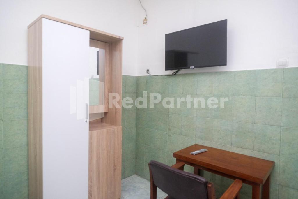 Kostel Satu Semarang RedPartner - Twin Room
