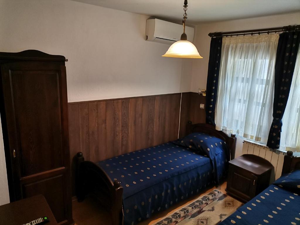 Postel nebo postele na pokoji v ubytování Hotel Bolyarka