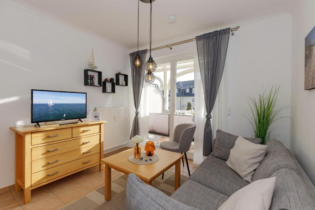 TV a/nebo společenská místnost v ubytování Apartment-Residenz Ostseestrand Apartment-Residenz Ostseestrand 21