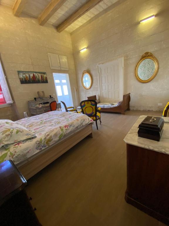 Postel nebo postele na pokoji v ubytování Palazzio 1787