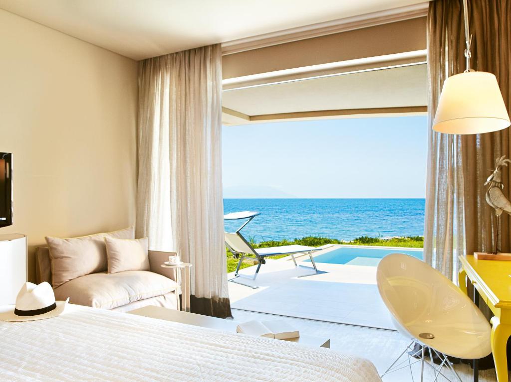 Кровать или кровати в номере Grecotel Astir Palace