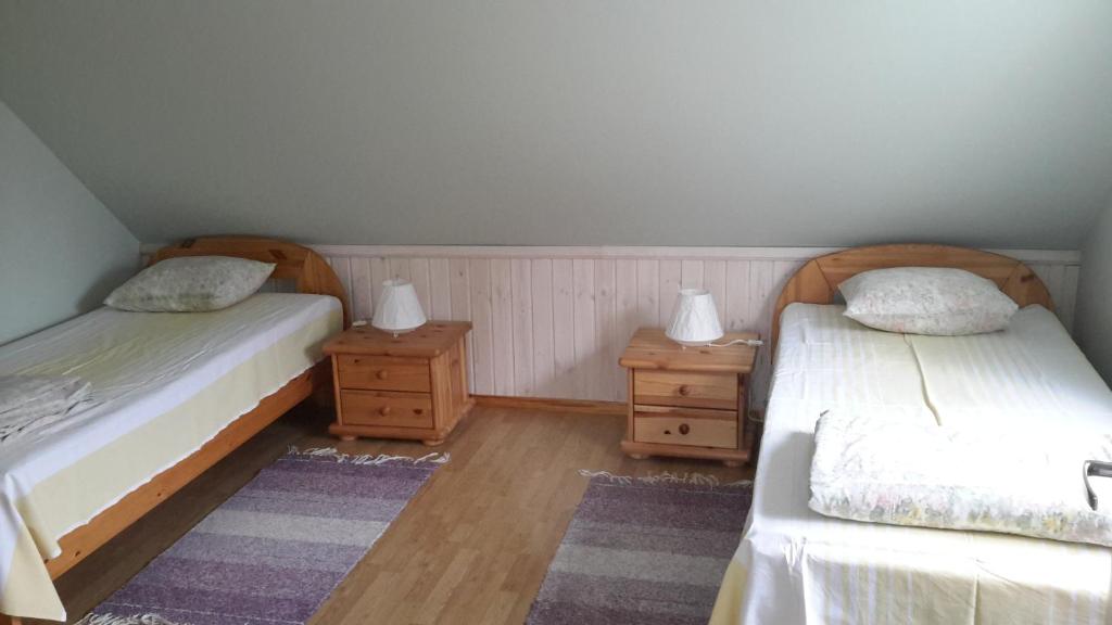 Voodi või voodid majutusasutuse Kaare Guesthouse toas