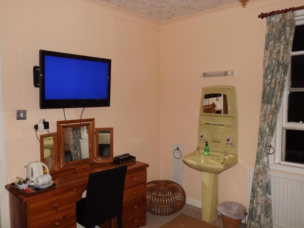TV a/nebo společenská místnost v ubytování Glenavon Homestay