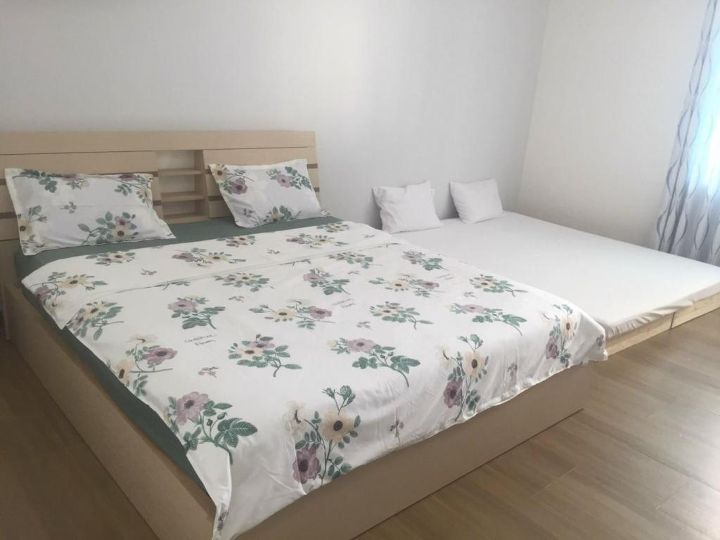 Кровать или кровати в номере N.nghỉ Nhật Hải