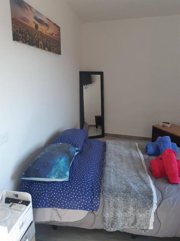 Postel nebo postele na pokoji v ubytování Guidonia Montecelio