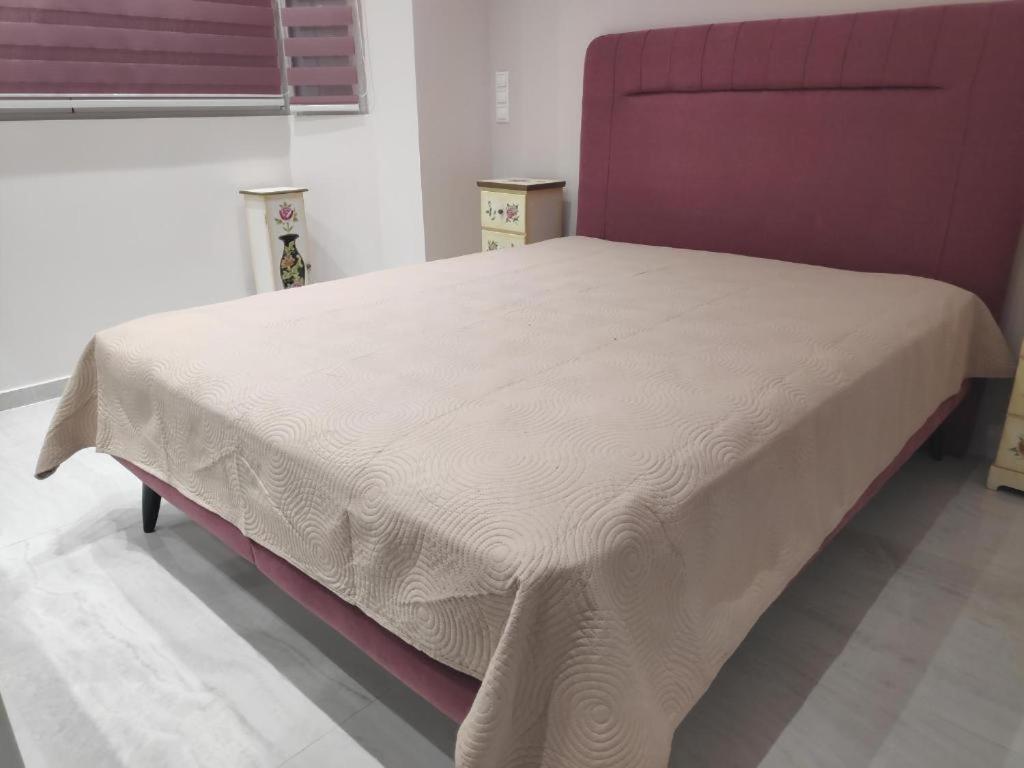 Posteľ alebo postele v izbe v ubytovaní Alimos Luxury Prestige