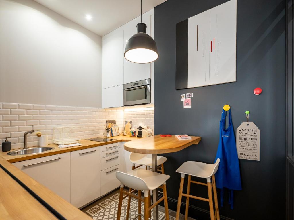 Cuisine ou kitchenette dans l'établissement L'Atelier,T3,au pied de l'Opéra, Climatisé, CHECK-IN AUTONOME 24H sur 24H